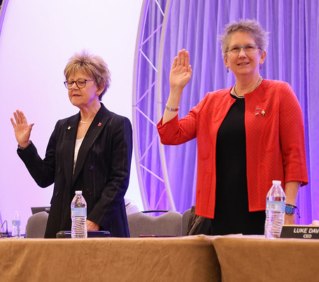 Karen Gorton and Elizabeth Rosser taking oath of office for the Board of Directors in 2025.