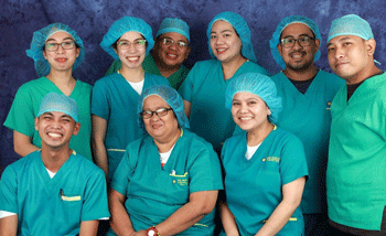 Simon-with-nurses-in-scrubs